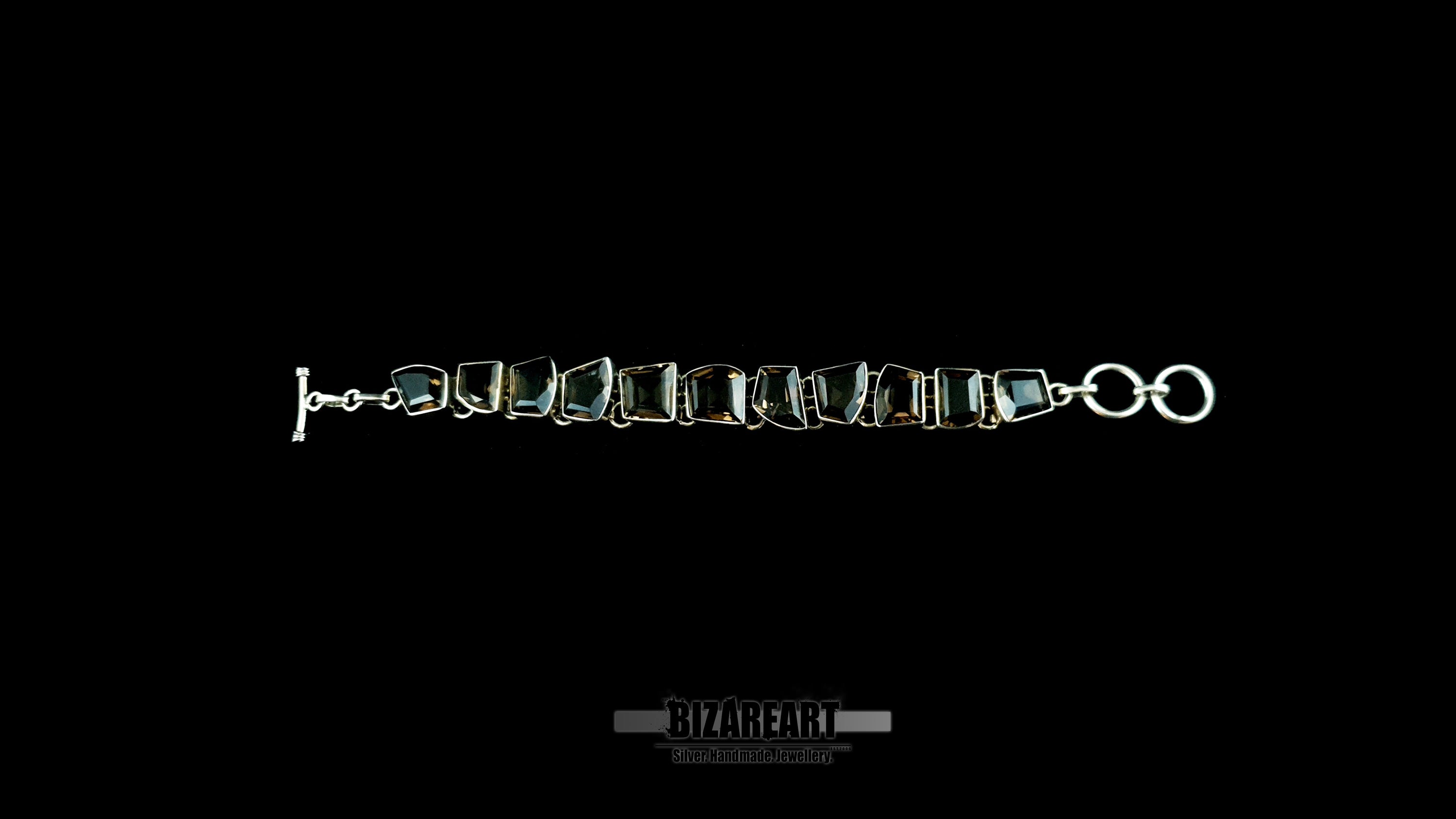 Full length 19.5cm sterling silver smoky quartz toggle bracelet.