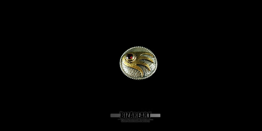 A sharp, clear view of the mixed-metal pendant design, emphasizing the contrast between the polished gold-plated accents and the oxidised silver base.
