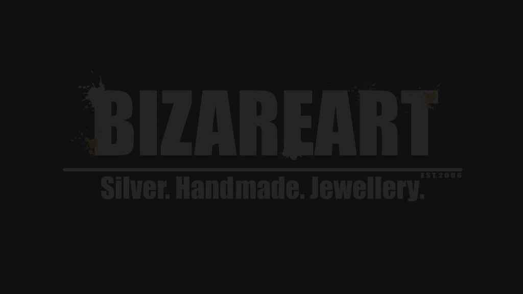 360-degree rotating video of the handmade vintage silver Tibetan ring by BIZAREART, showcasing all angles of the agate, coral, and turquoise craftsmanship.
